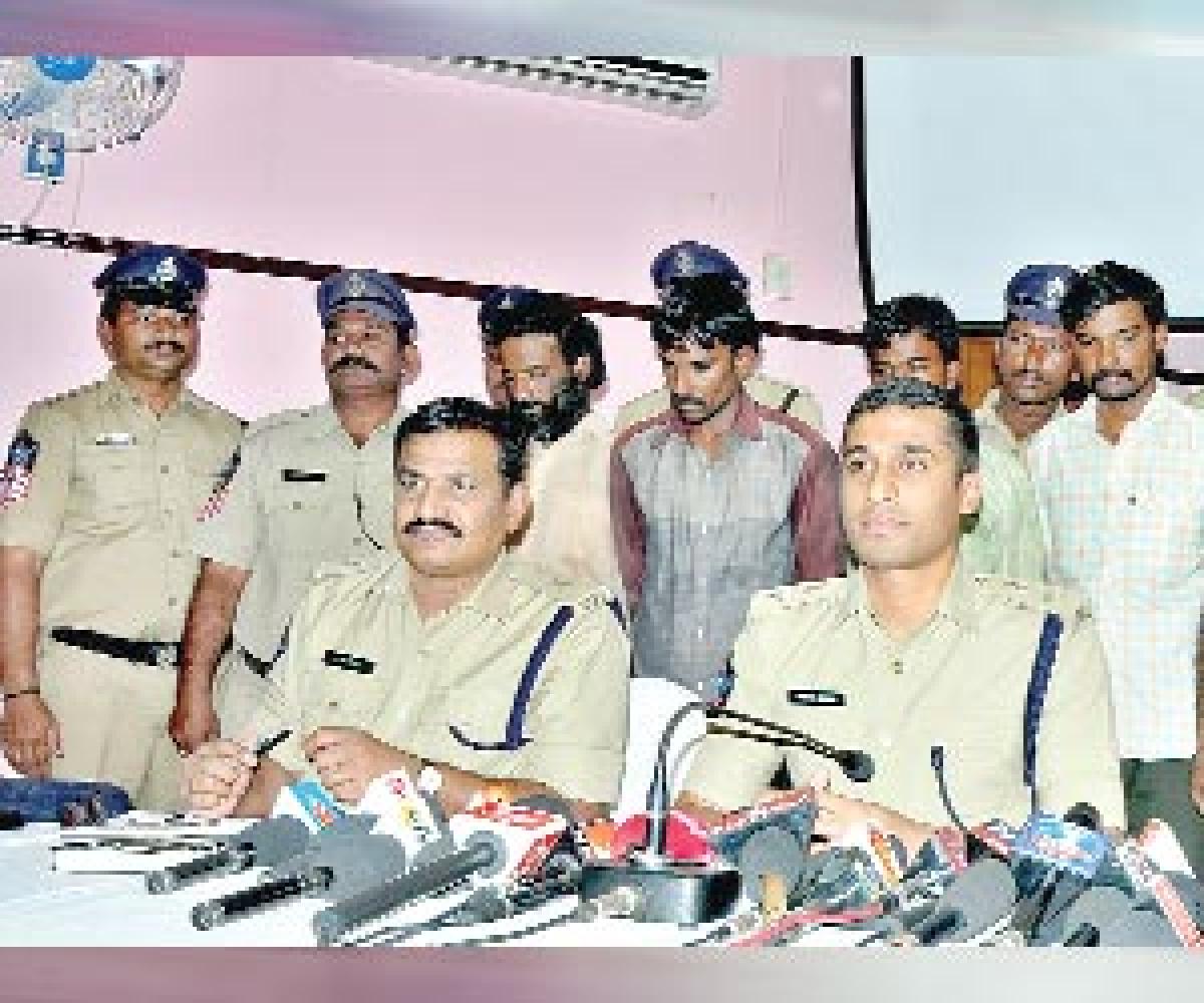 34 red sanders logs seized; four held