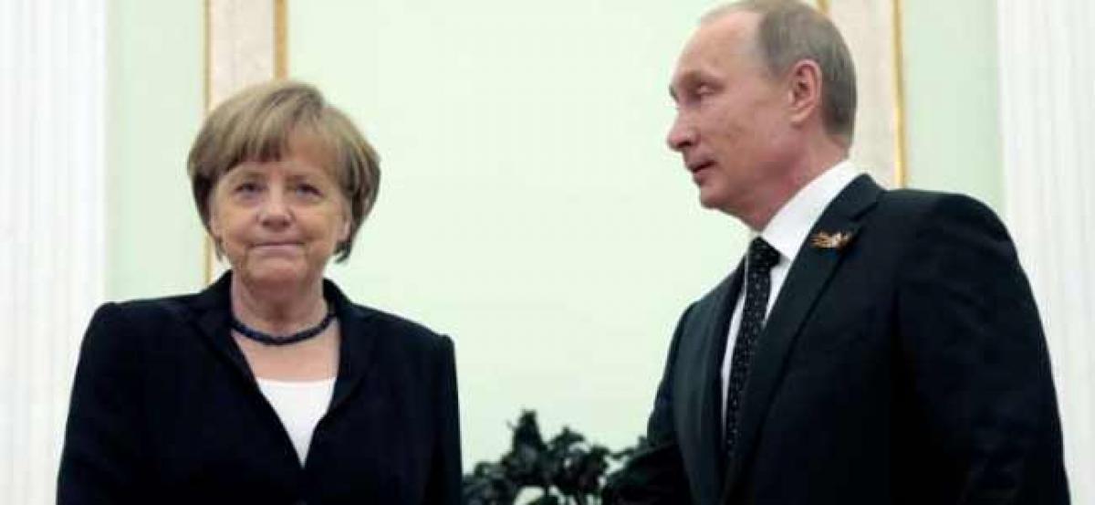 Merkel makes rare Russia visit as Putin backs warmer ties