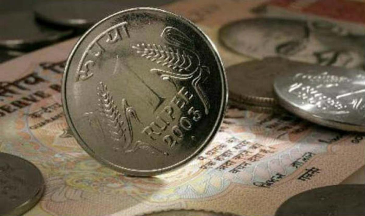 Rupee gains 4 paise against dollar to 67.29