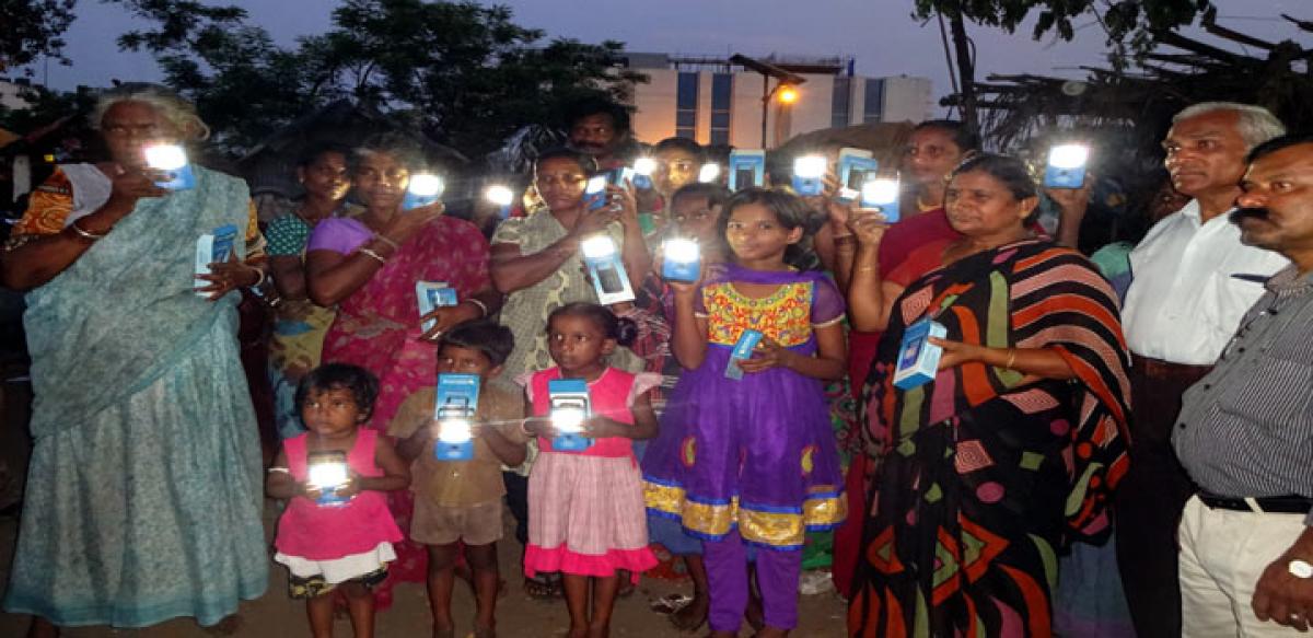 MSI distributes solar lights to slum dwellers