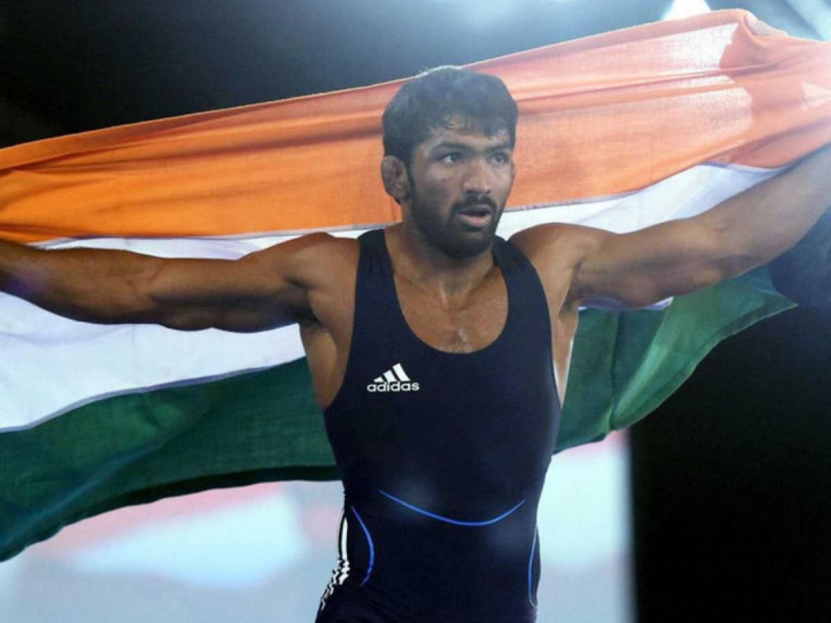 Wrestler Yogeshwar Dutt may move up from bronze to silver in London Olympics
