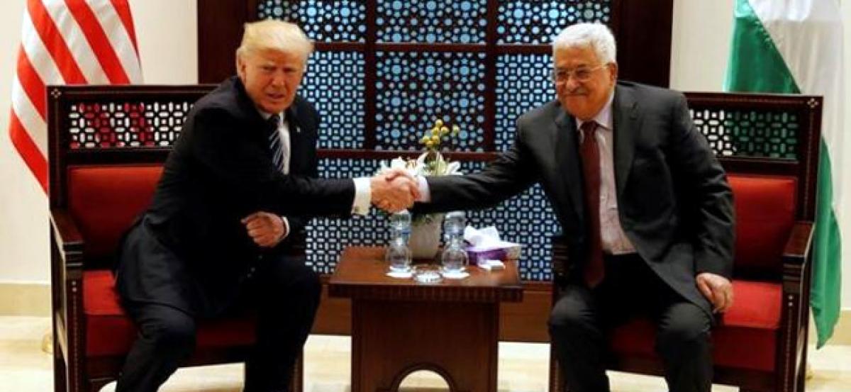 Trump plays up Middle East peace hopes after talks with Palestinian president