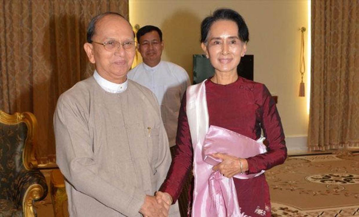 Suu Kyi holds warm talks with Myanmar president on power shift