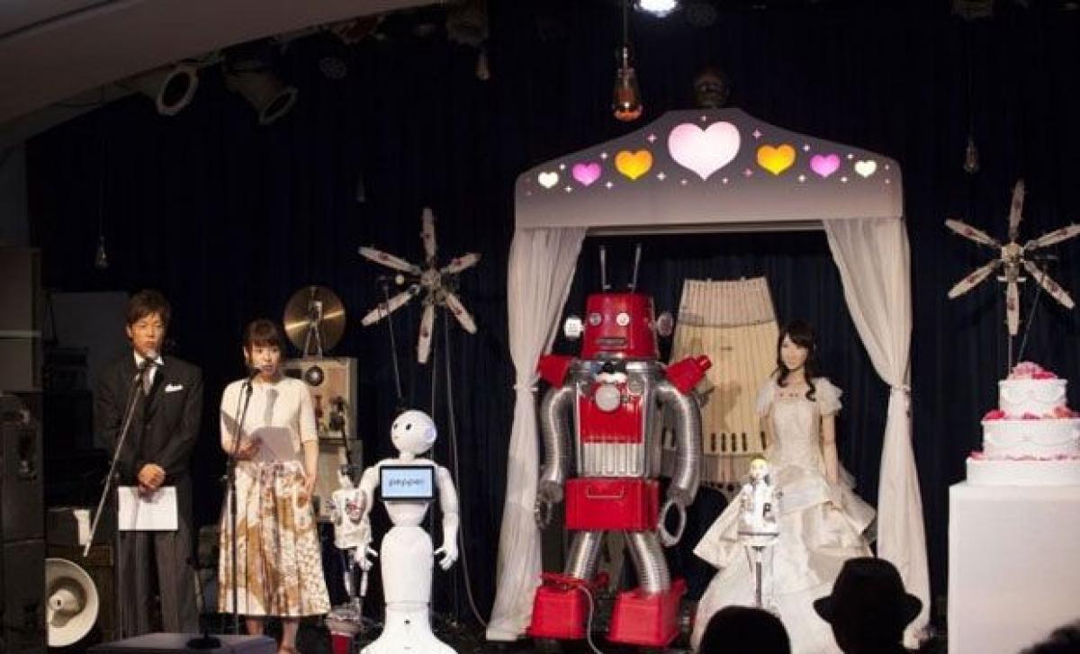 Japan hosts Worlds first robot wedding