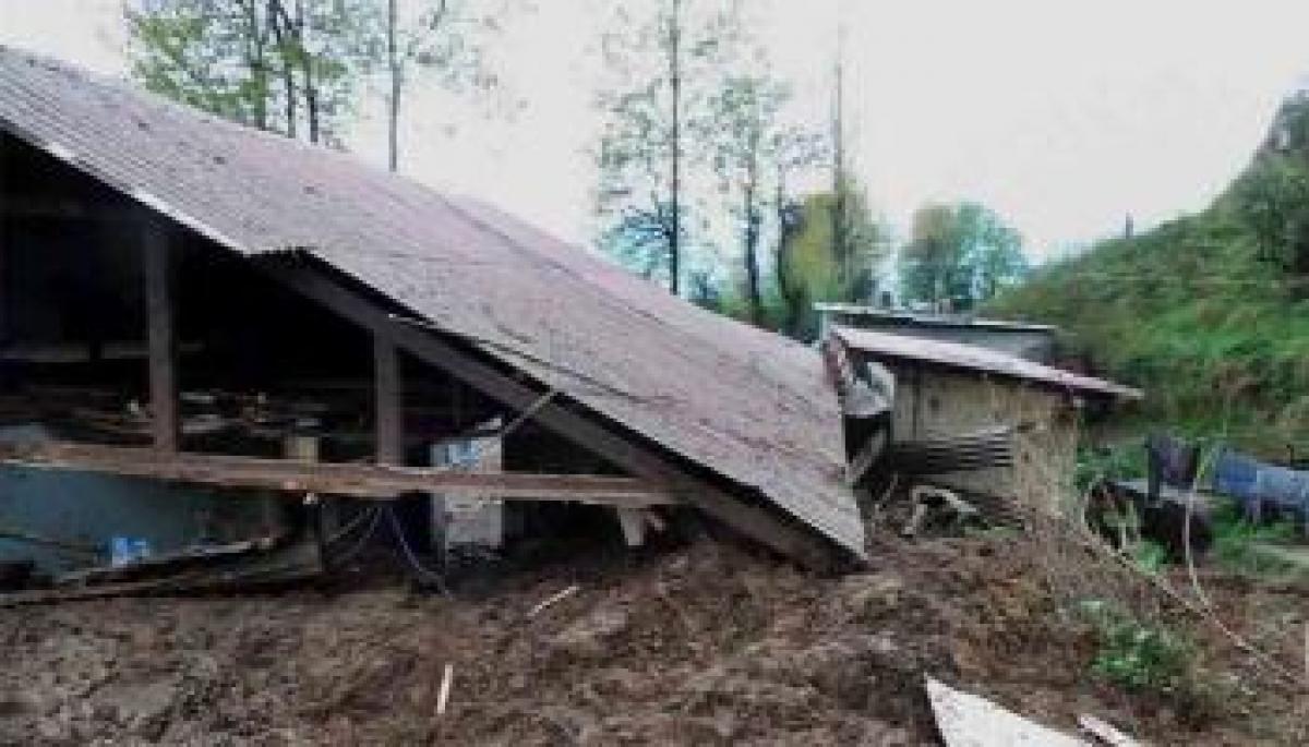 Wall caves into the house after landslides in Assam