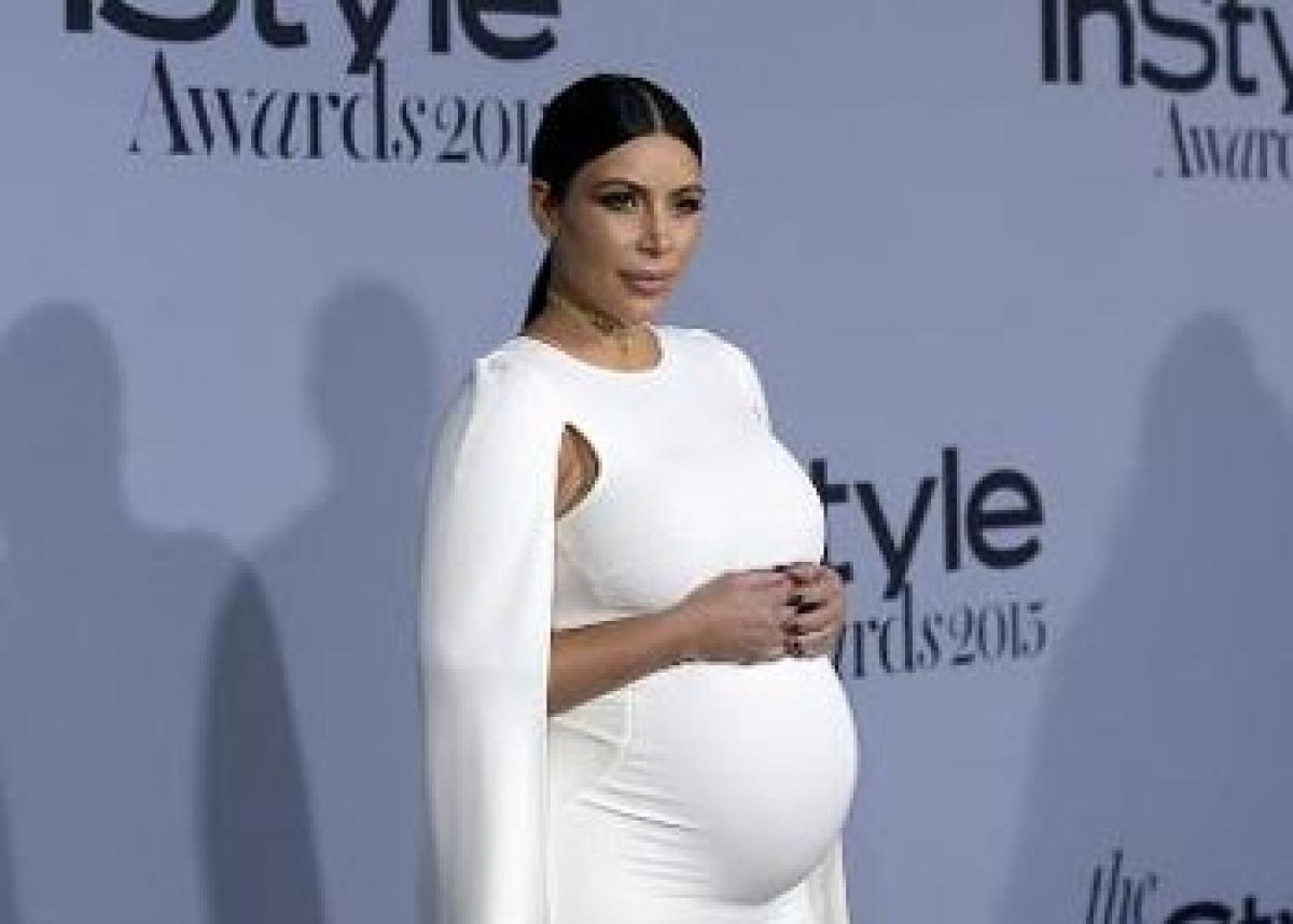 Kim K back to signature style within three months post delivery