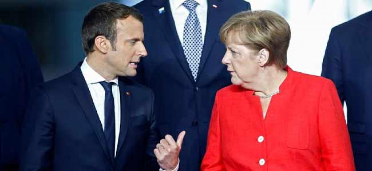 German Chancellor Angela Merkel, French President Emmanuel Macron