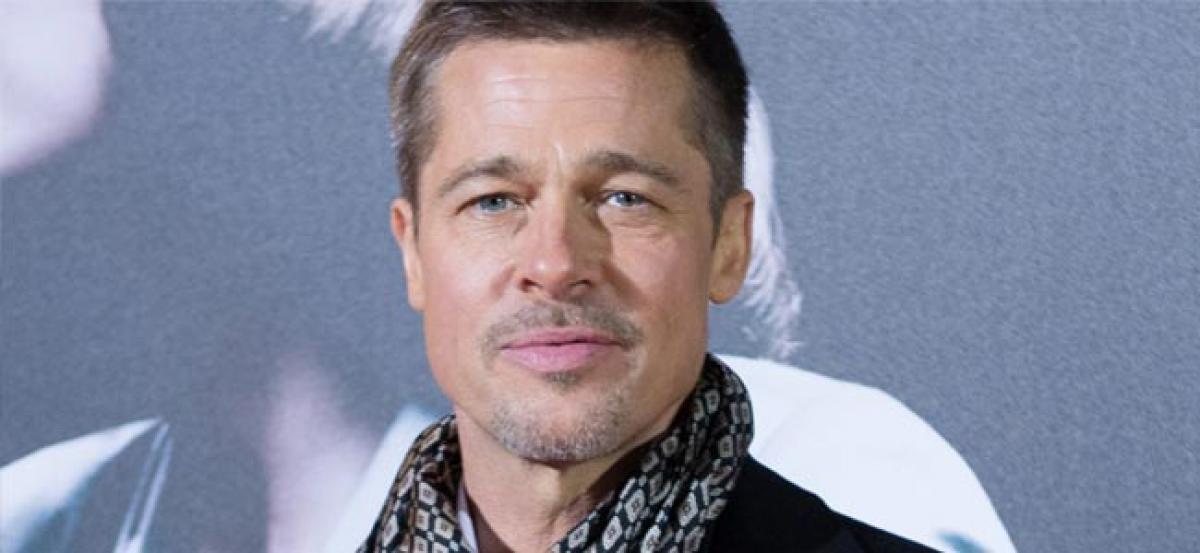 Brad Pitt didnt attend the Oscars as he was busy sculpting