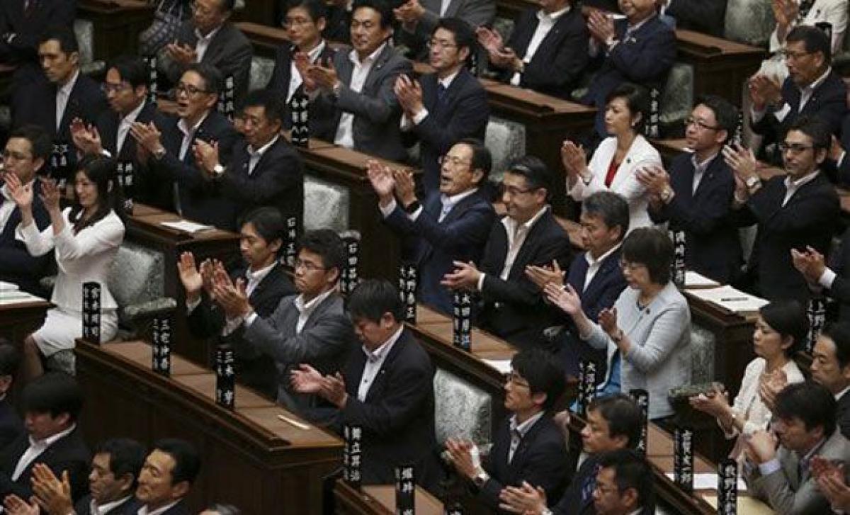 Opponents vow to fight laws expanding role of Japans military