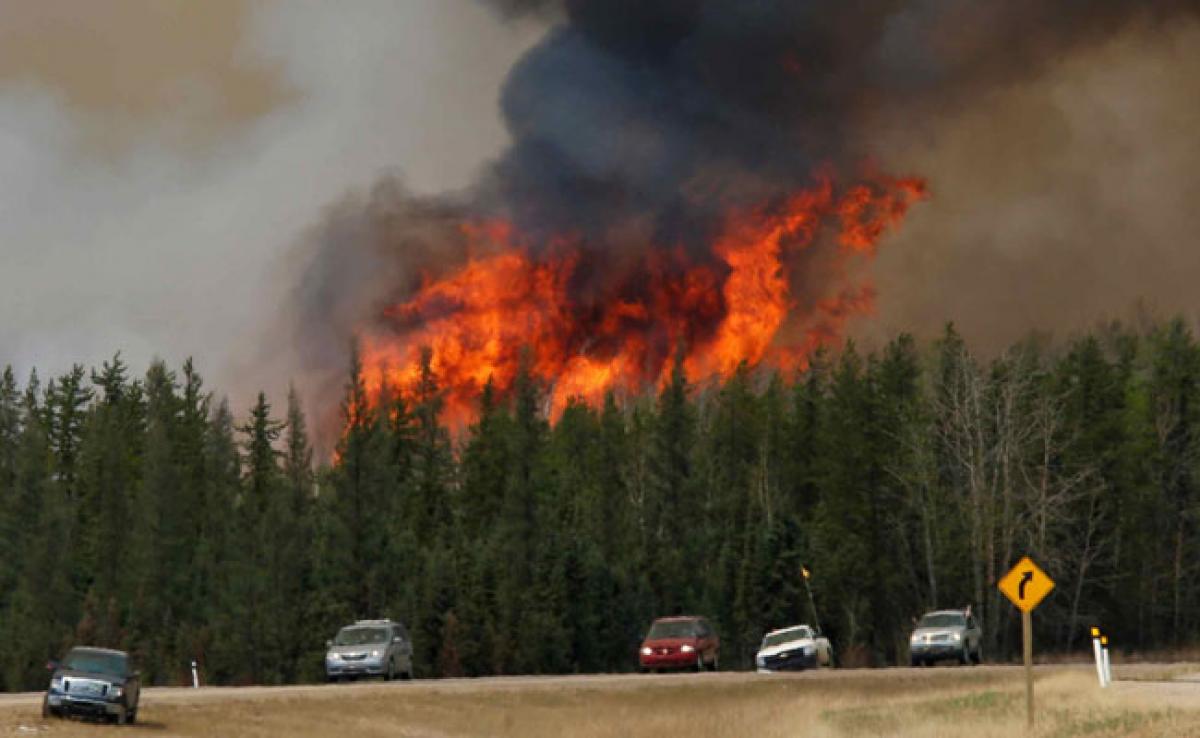 Cooler Weather Welcomed In Canadas Fire-Stricken Energy Heartland