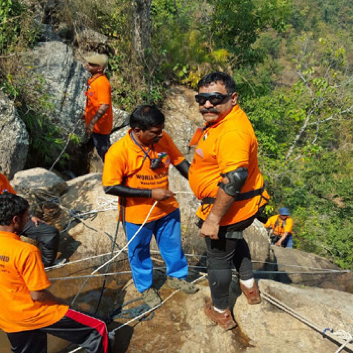 World record set in waterfall rappelling at Katika Falls