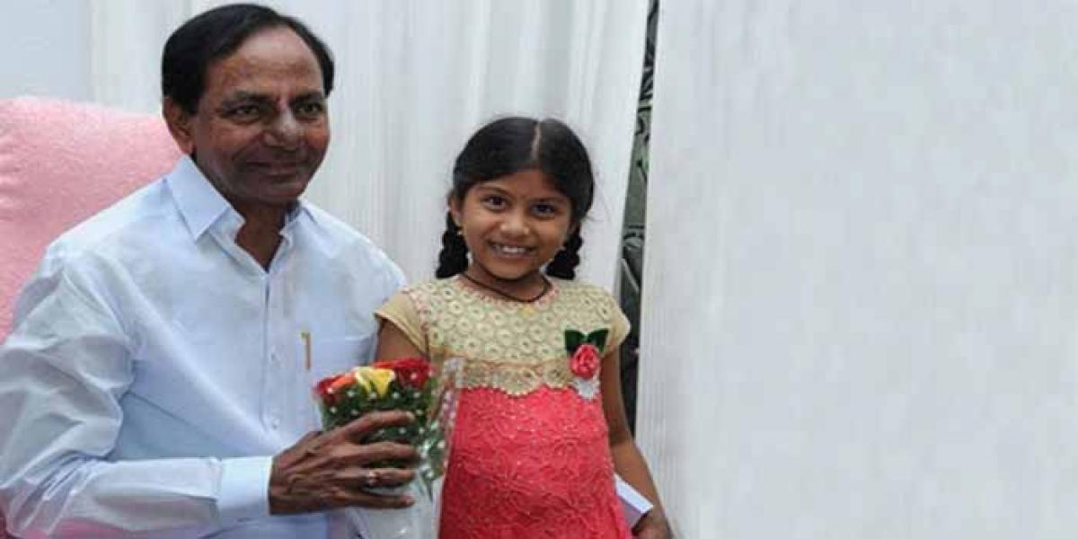 KCR hands over Rs 10 lakh cheque to child prodigy Srija