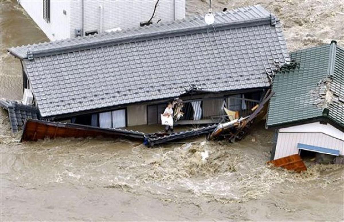 Japan city flooded as raging river bursts its banks