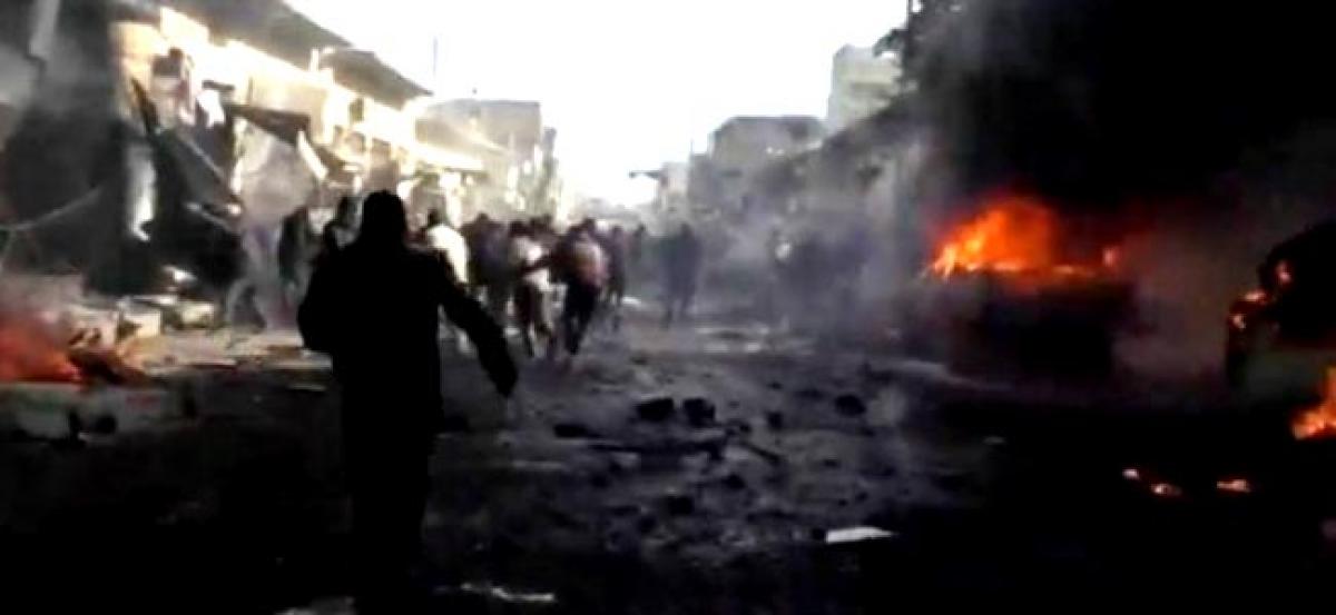 Blast in Syrian town on Turkish border kills nearly 50