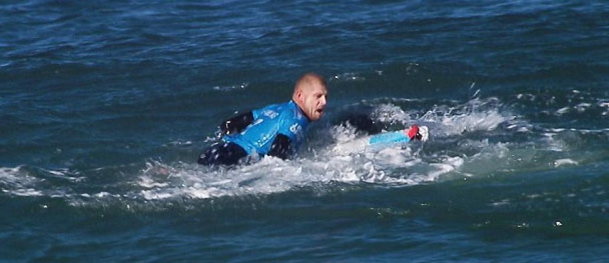 Surfer punches shark to escape attack