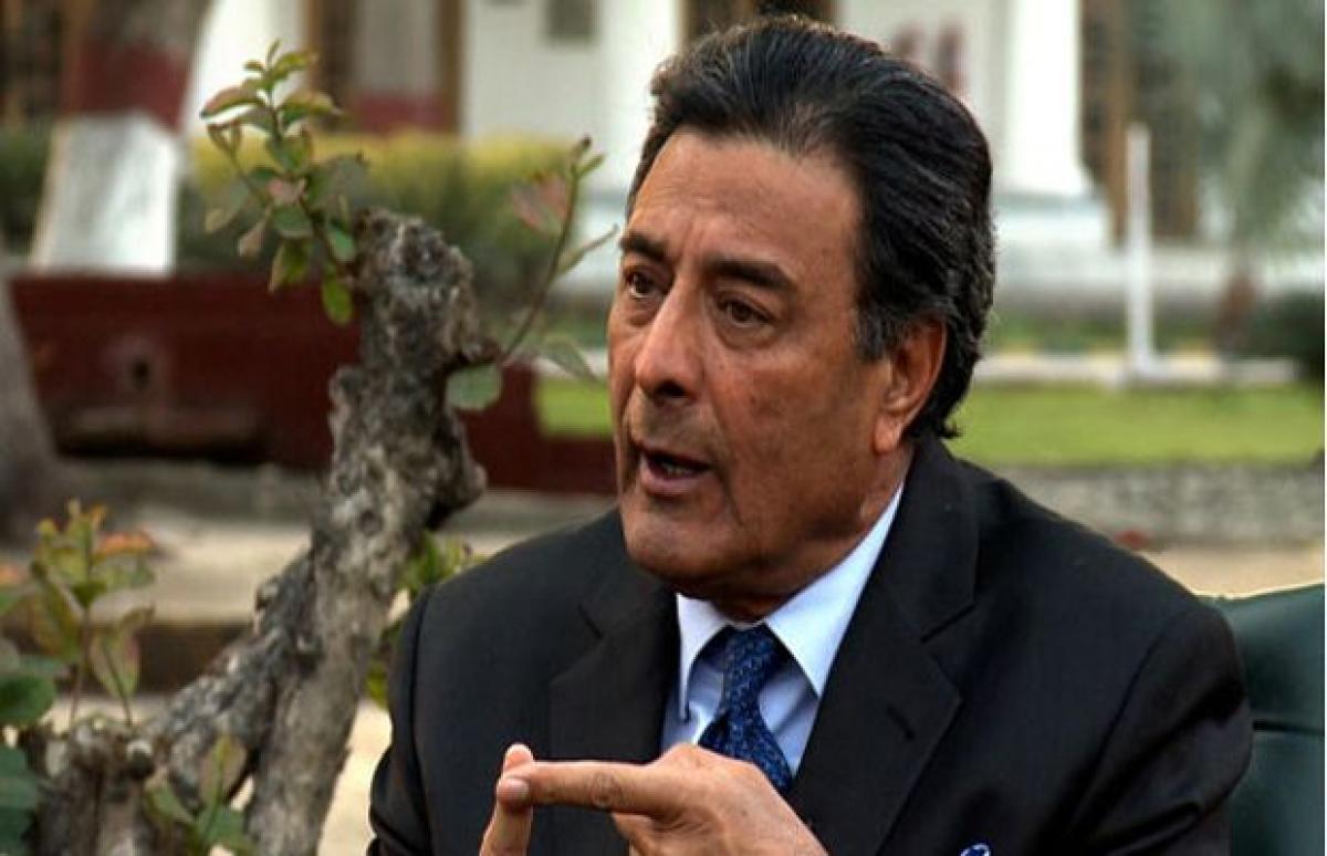 Pakistans Punjab Home Minister Shuja Khanzada, 8 others die in suicide attack