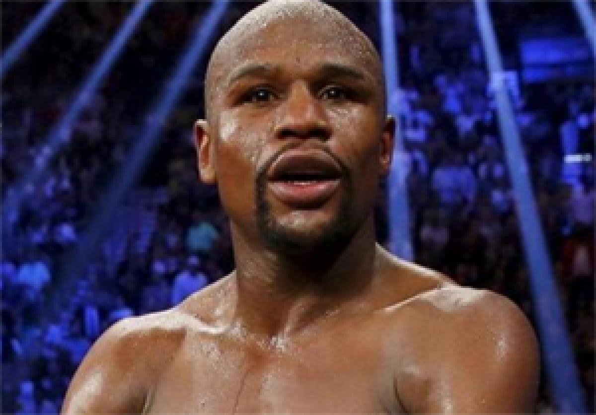 Floyd Mayweather steps into the ring to face Andre Berto in Las Vegas