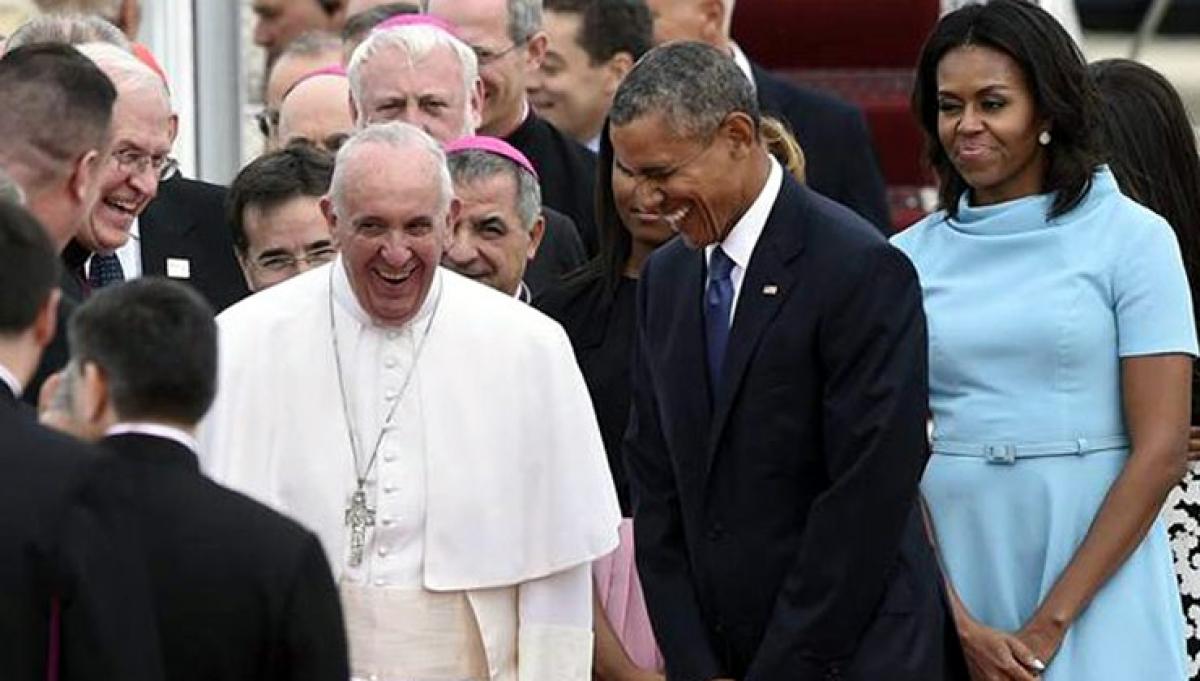 Obama rolls out a red carpet to welcome Pope Francis