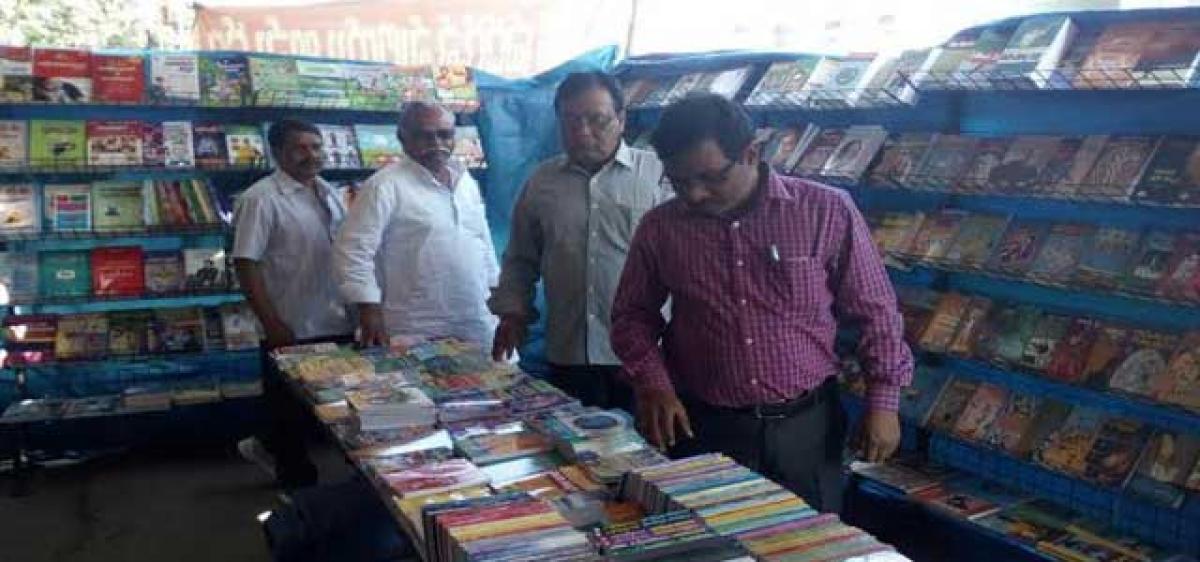 Civic chief inaugurates book exhibition in Siricilla