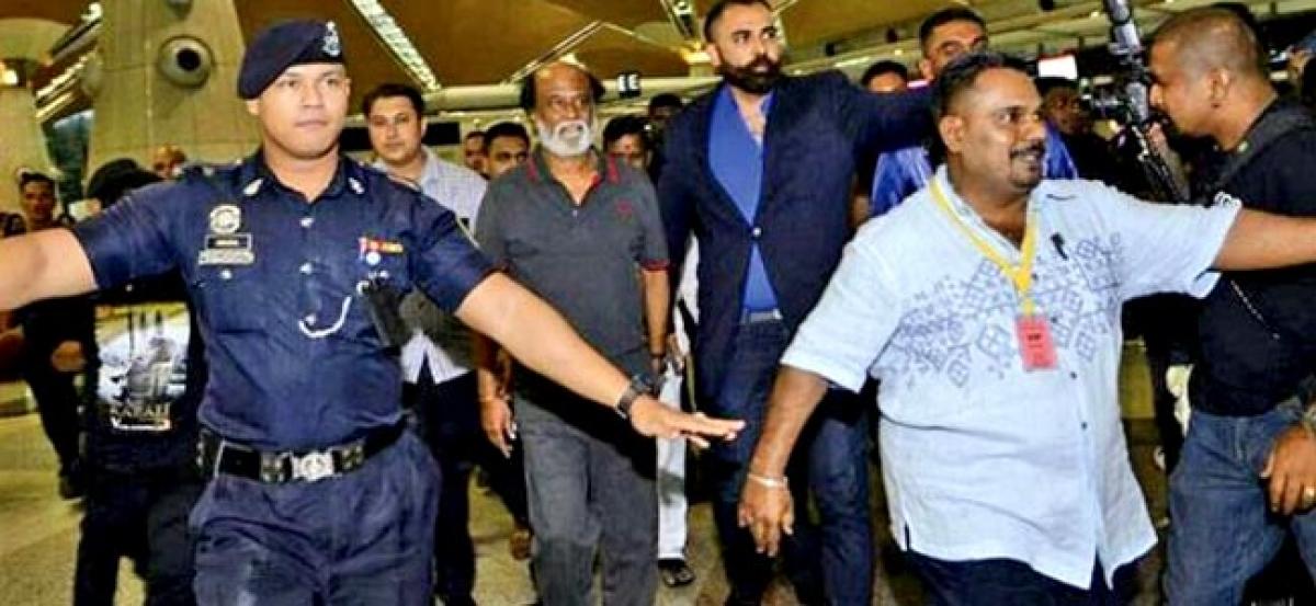 Rajni fans give him a rousing welcome at Chennai airport