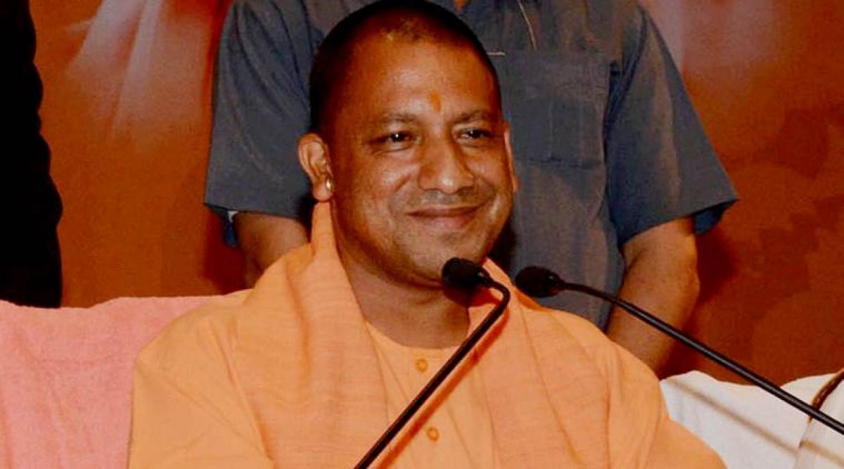 Yogi Adityanath keeps Home, Mining ministry to himself