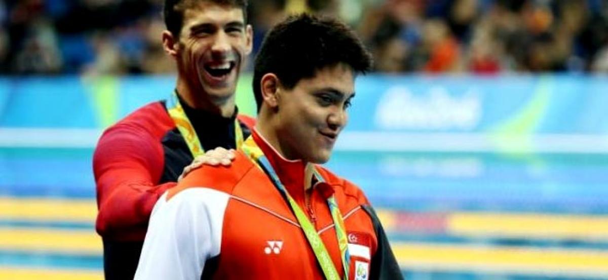 Swimming: Schooling wins Singapores first gold