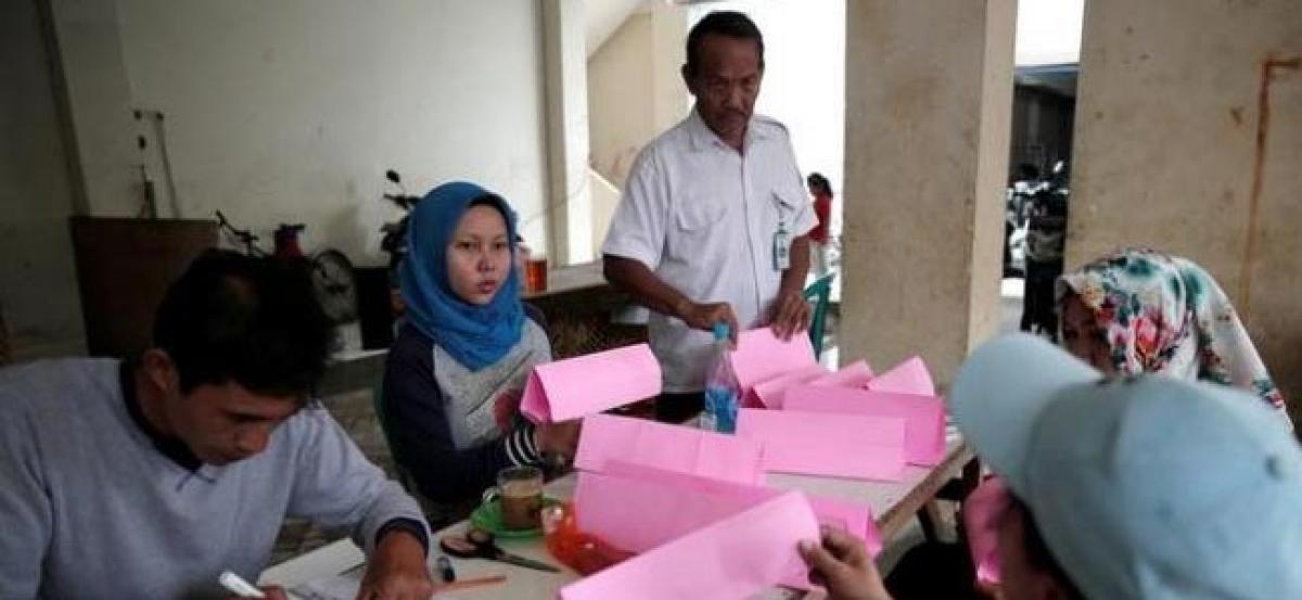 Election in Indonesian capital heads for run-off after tense campaign