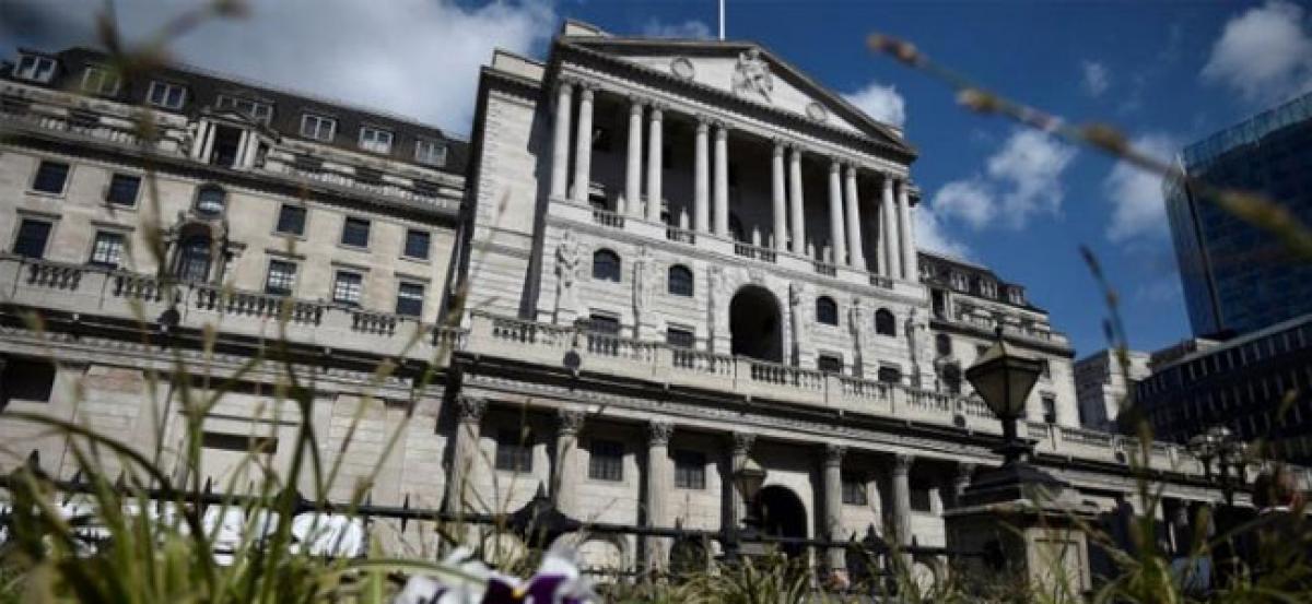 Bank of England reports consumer squeeze, solid business investment