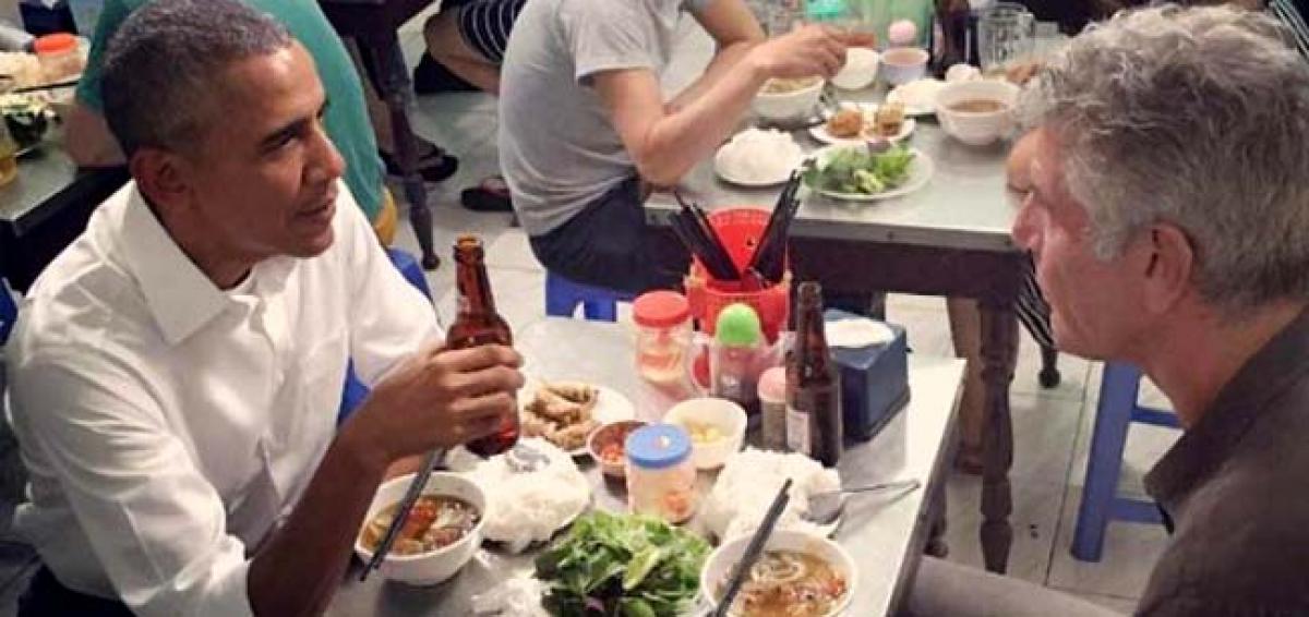Chilling out: Its chopsticks and beer for Obama in Vietnam