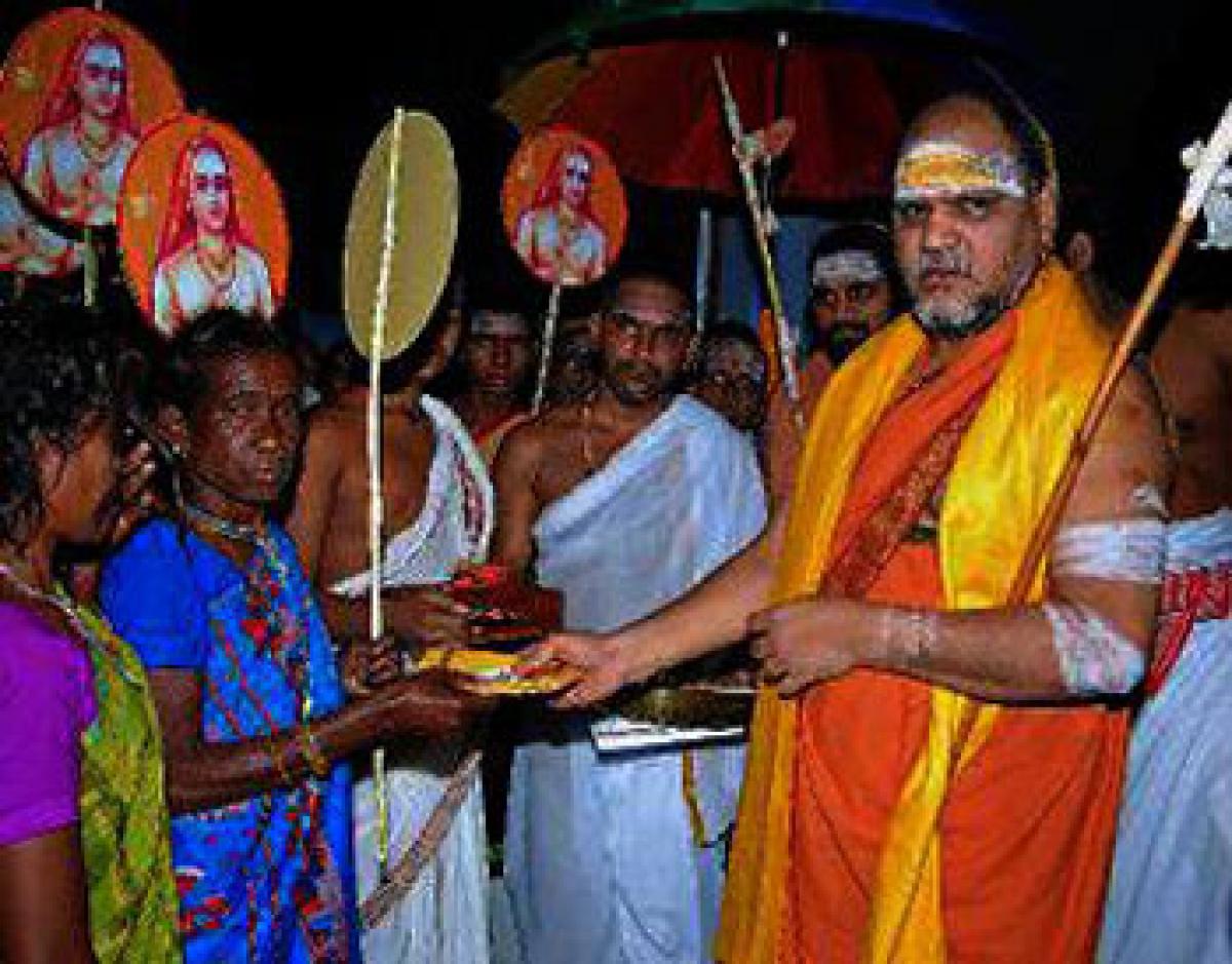 Seer distributes cows to tribal farmers