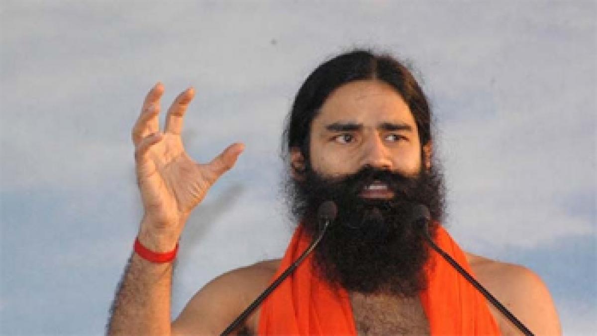 Cong charges Ramdev for rebellion by party MLAs in Uttarakhand