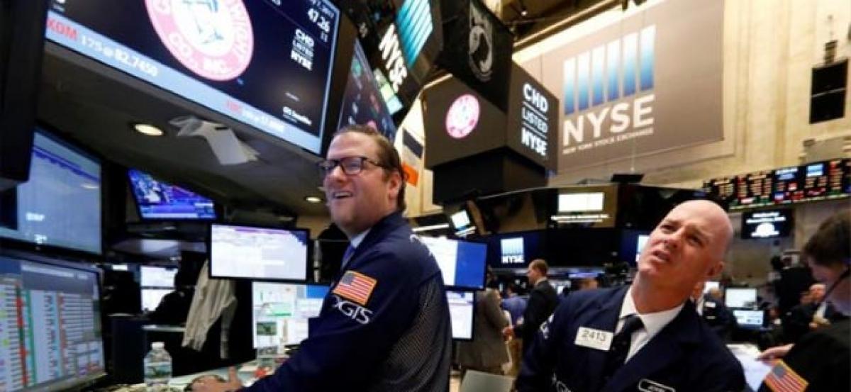 Wall Street hits record on Trumps tax comments, strong data