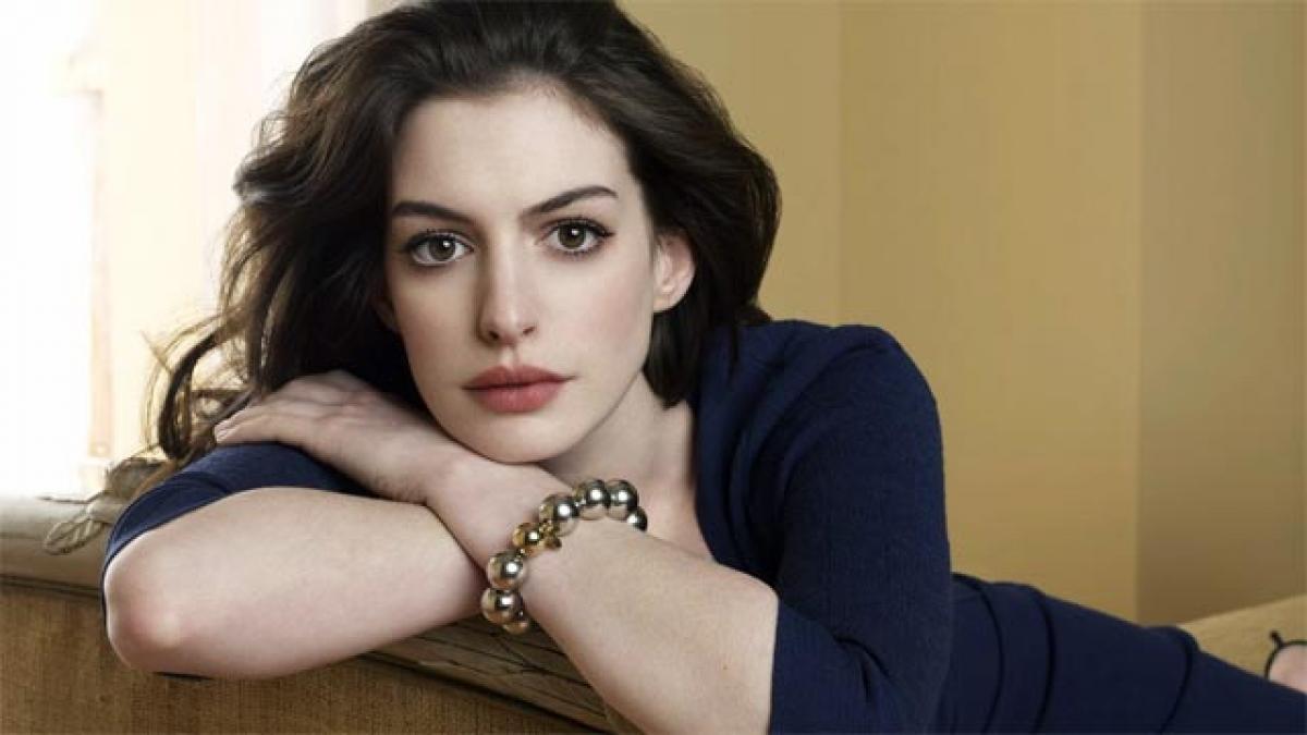 Anne Hathaway proud of her body