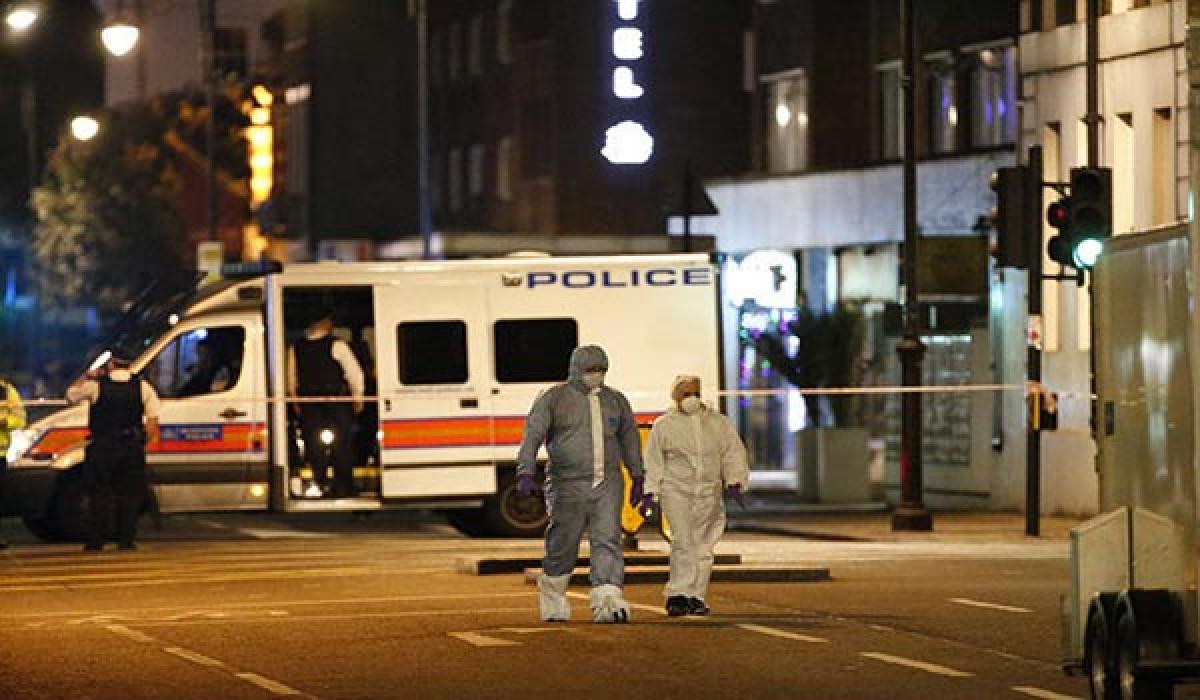 London woman stabbed to death, six wounded in suspected terrorist attack