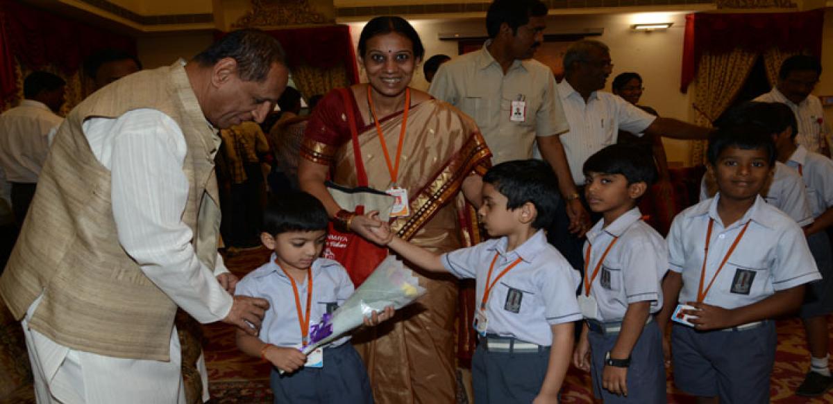 Children throng Raj Bhavan, interact with Governor