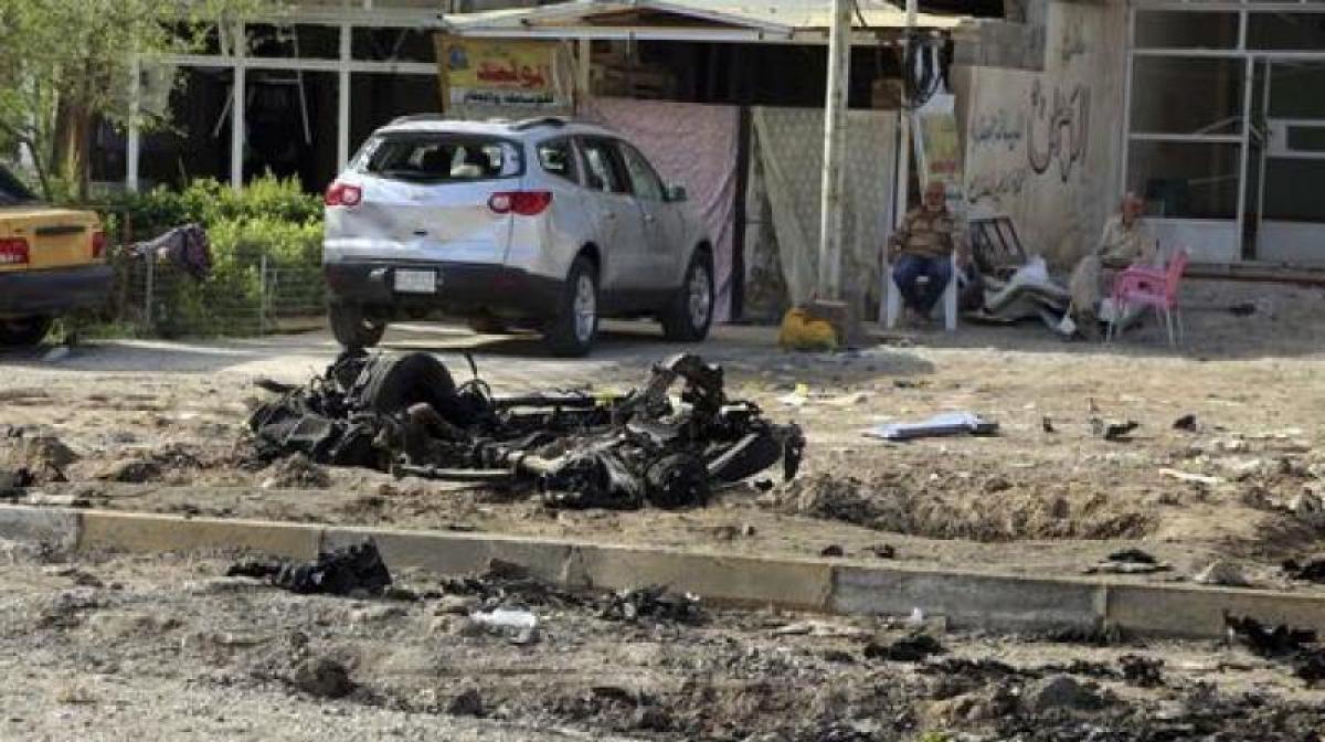 Iraqi officials: Attack on cafe north of Baghdad kills 13