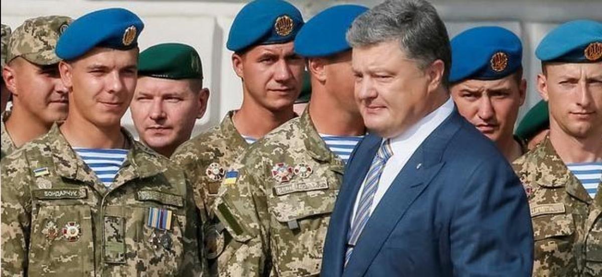 Ukraines Poroshenko says tougher to secure Western support against Russia