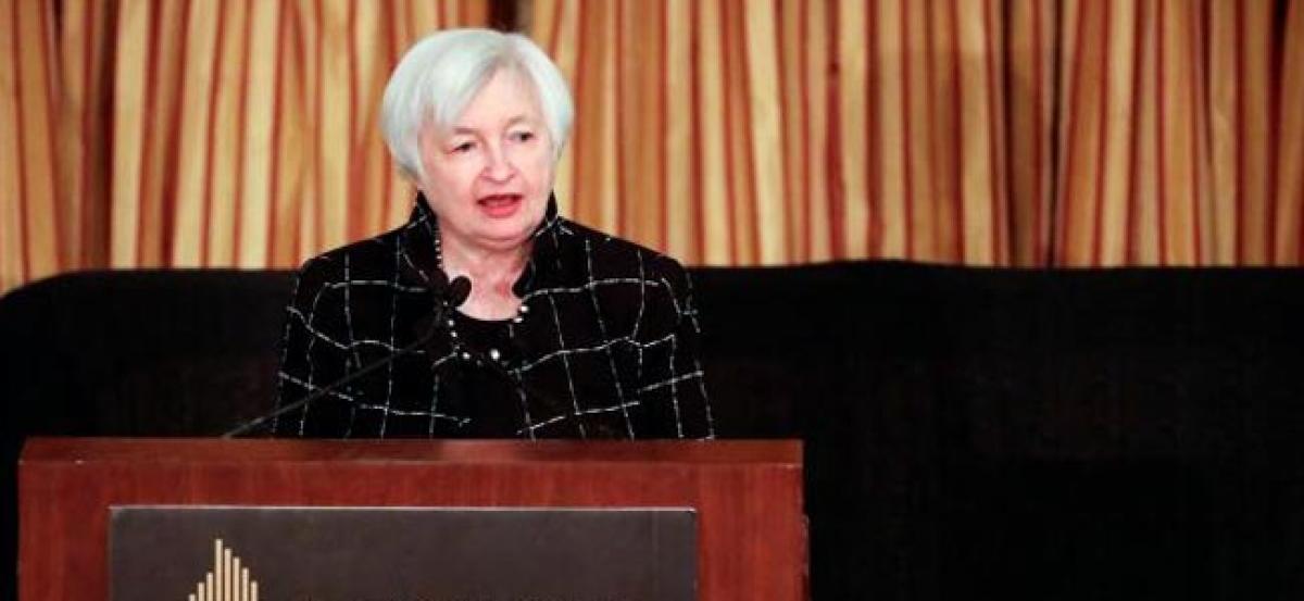 Yellen points to March rate hike as Fed signals end of easy money