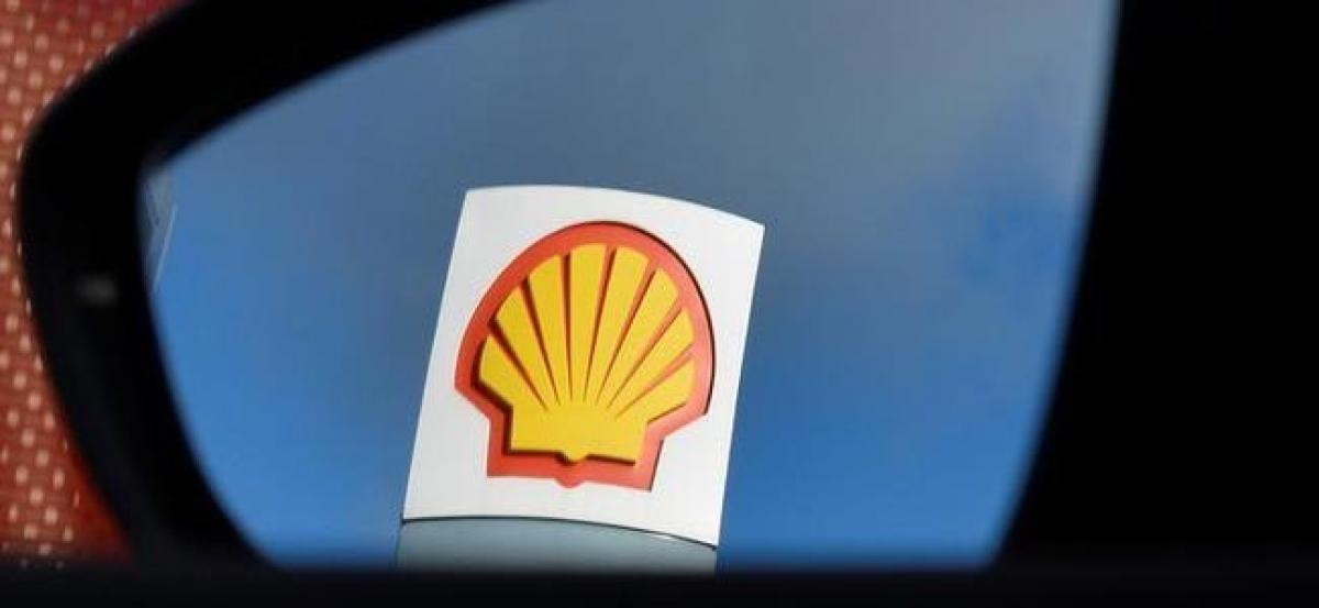 Shell beats profit forecasts, targets lower 2017 spending