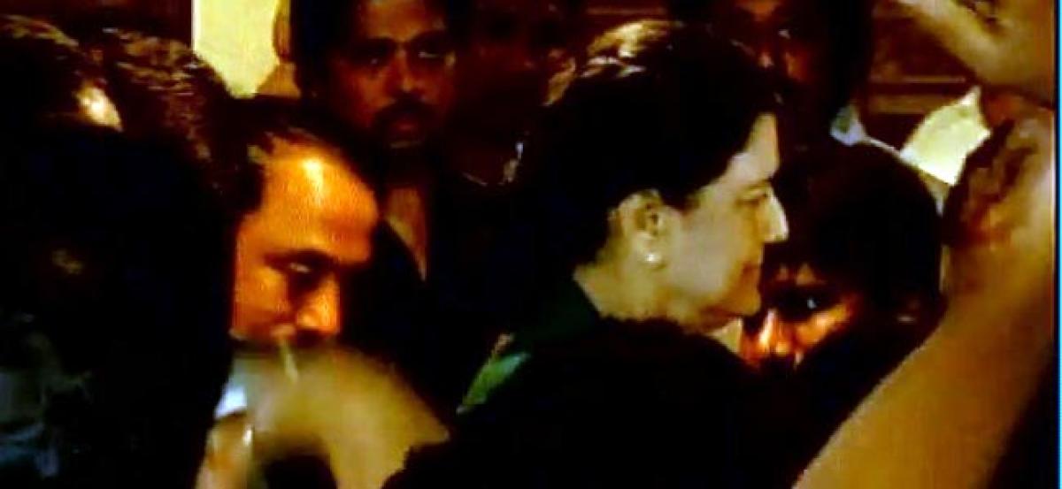 Sasikala surrenders, supporters clash with police