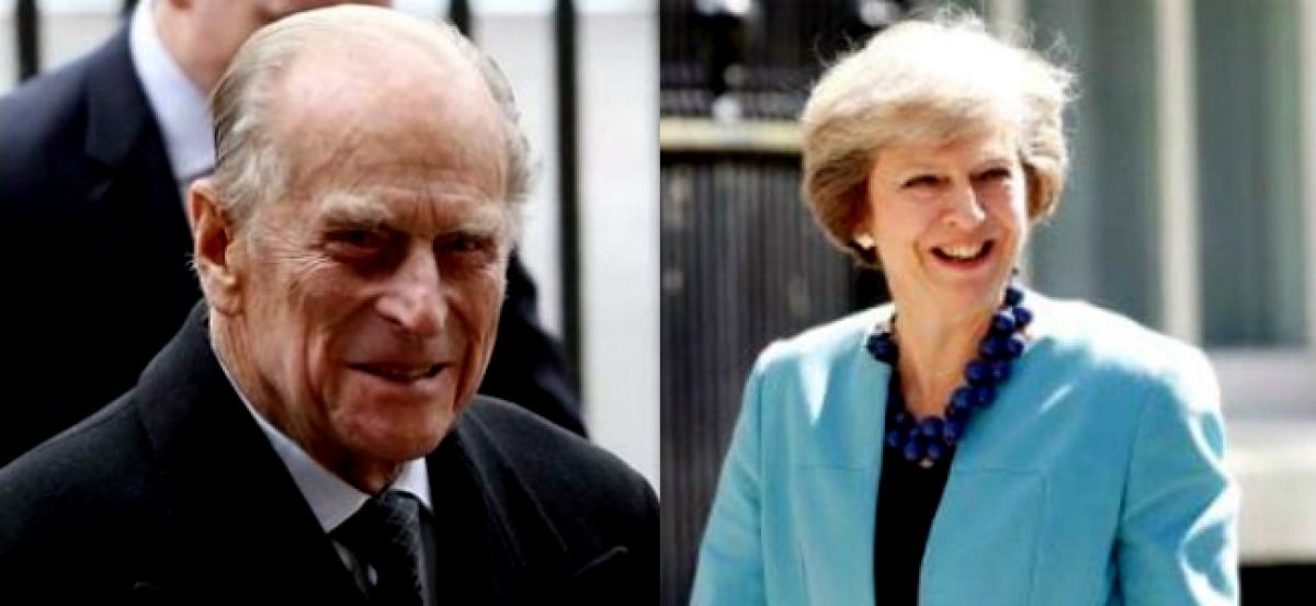 Britains Theresa May pays tribute to Prince Philip