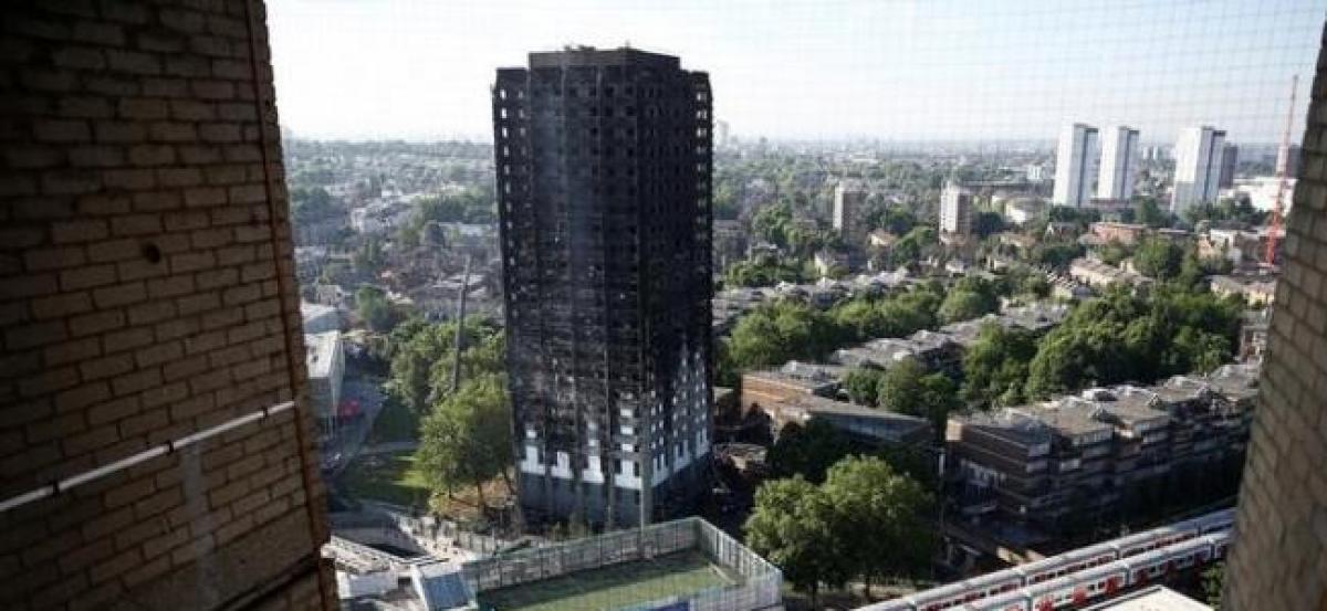 Death toll of 12 expected to rise in London tower block fire