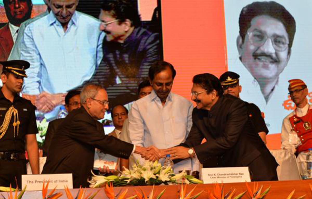 Live in harmony, Prez tells Telugu people