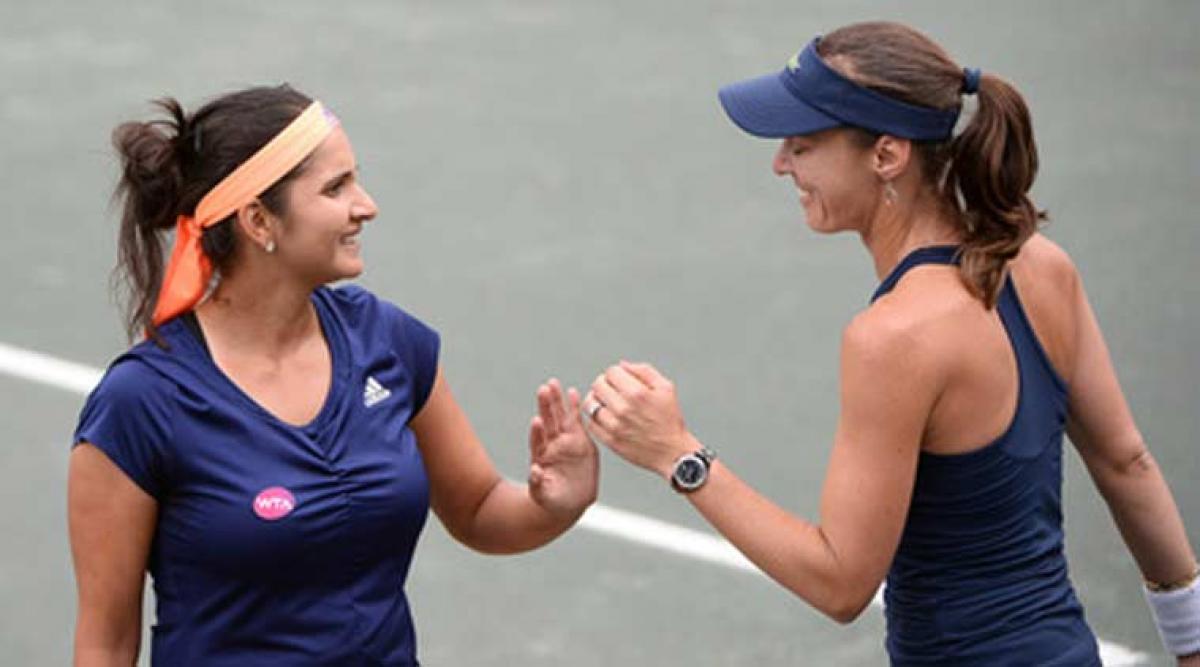 Mirza-Hingis storm into US Open quarters