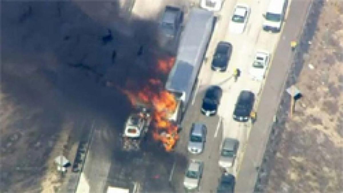 Swiftly-moving California wildfire engulfs freeway, 20 cars charred