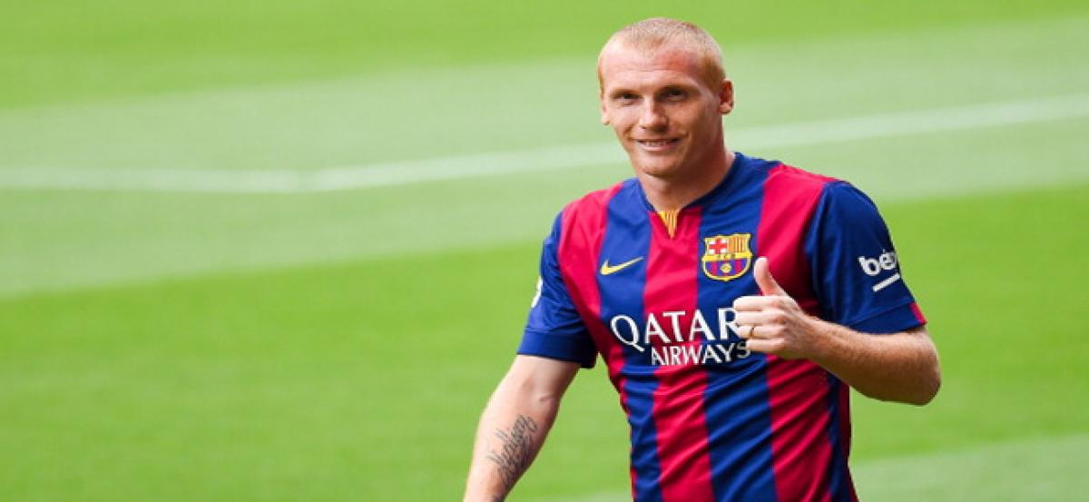 Jeremy Mathieu returns to Barcelona training