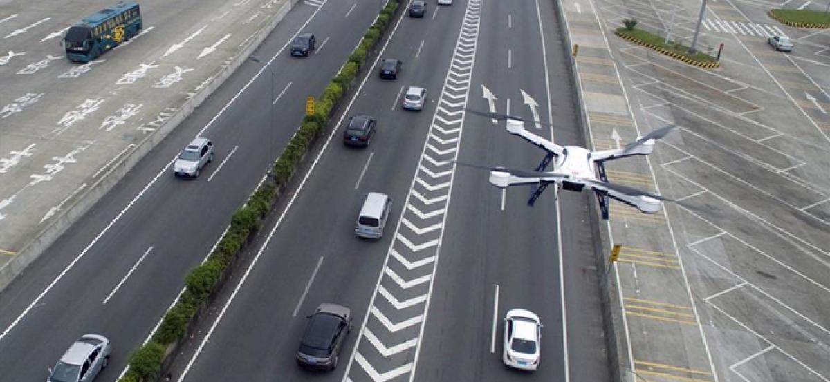 Traffic cops in China using drones to patrol the roads during national holiday