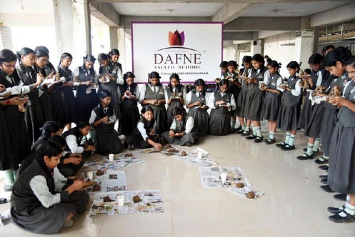 Students make eco-friendly clay Ganeshas