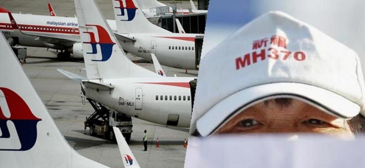 Malaysia Airlines search delayed by rough seas, strong winds