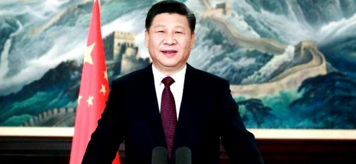 Chinas Xi Jinping says wont let anyone make fuss about its territory